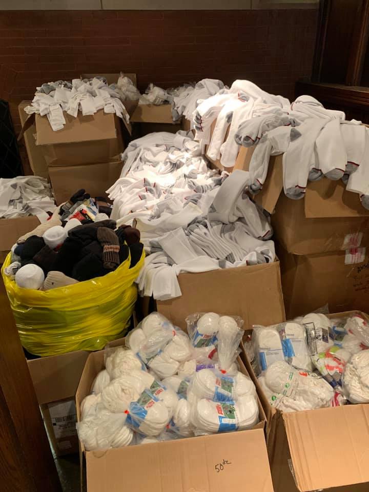socks collected by members of All Saints and Holy Family during Advent